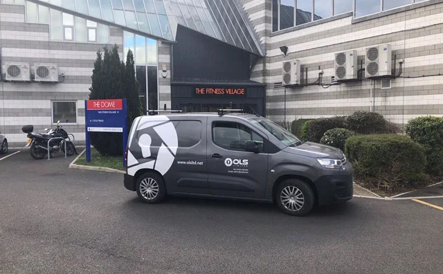 OLS van outside business